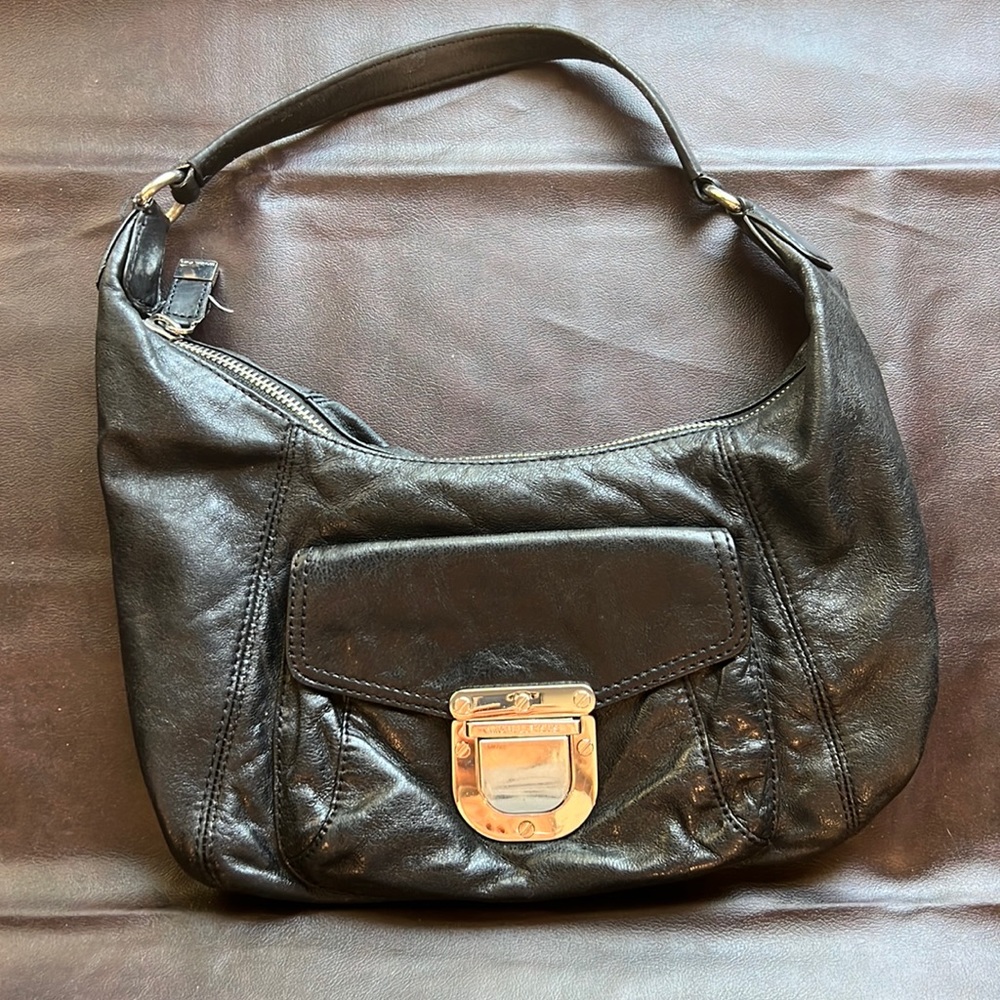 Under $20 bogo 50% off. Michael Kors black leather bag